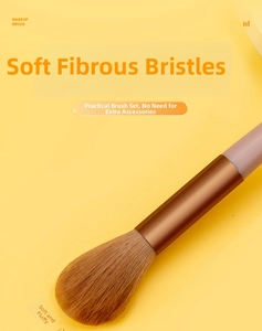Detailed macro of a fluffy bionic fiber makeup brush with soft bristles and purple handle