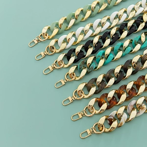 Chunky acrylic resin bag straps with gold metal clasps in various vibrant colors