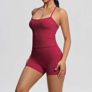 Detail view of burgundy brushed fabric yoga set featuring high-waist shorts and U-neck tank top