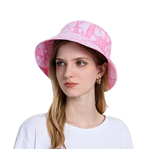 Pink and white tie-dye bucket hat for women with sun protection and classic round top style