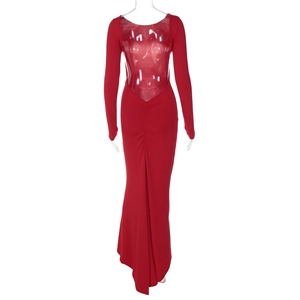 Detail view of red backless floor-length dress showing elegant ruching and long sleeves