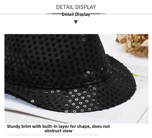 Détail du chapeau de jazz à paillettes noires montrant le bord renforcé et la couche de forme