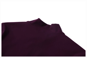 Detail of mock neck zipper collar and reinforced stitching on dark purple yoga jacket
