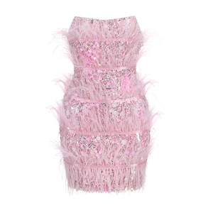 Detail of pink strapless mini dress featuring shimmering sequins and ostrich feathers