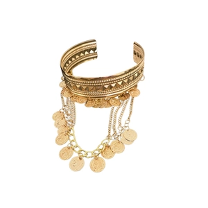 Bohemian gold open bangle bracelet with coin fringe pendants on white background