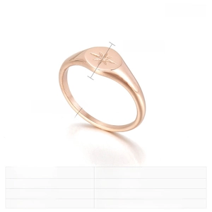 Macro detail of 7mm rose gold stainless steel star ring with size specifications