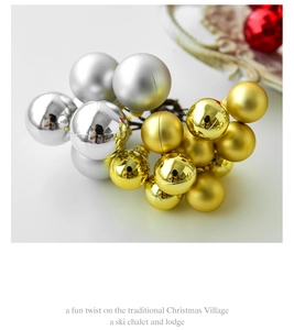 Close-up of gold and silver Christmas decorative ball clusters with metallic finish