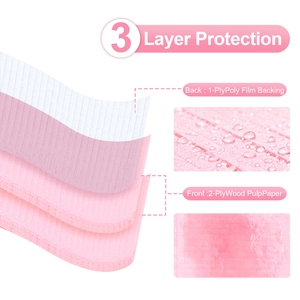 Disposable pink nail mat with 3-layer protection showing waterproof poly film and paper layers
