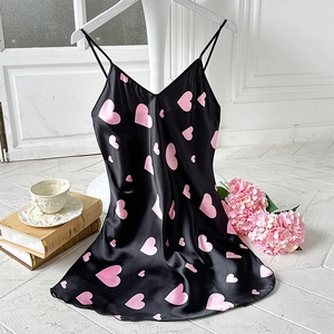 Elegant black silk satin slip dress with pink heart patterns and thin straps