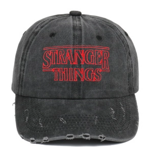 Close-up of red Stranger Things embroidery and distressed brim on washed cotton cap