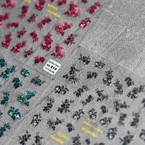 Retro flower nail stickers in red, green and black colors with thin flexible texture