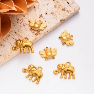 Golden elephant and bee pendants in matte stainless steel for DIY jewelry making