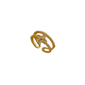 Gold plated double-layer open ring with sparkling clover zircon stones on white background