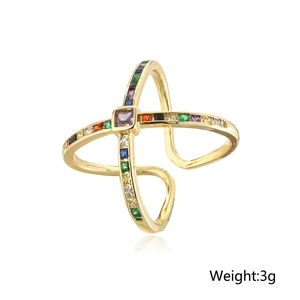 Detail shot of a 18K gold plated cross ring with multicolored zircon stones and 3g weight