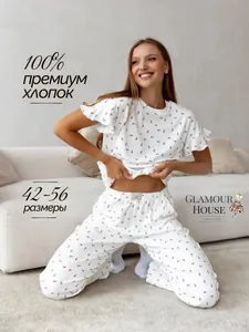 Detail of soft 100% cotton cherry print pajama set showing tiered ruffle sleeve design