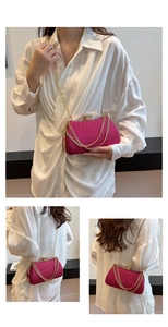Three-way view of hot pink party clutch with crystal clasp and gold chain strap
