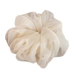 Elegant oversized organza scrunchie in creamy white with voluminous pleated texture