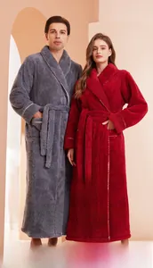 Detail of thick flannel bathrobes featuring kimono collar and waist tie for couples