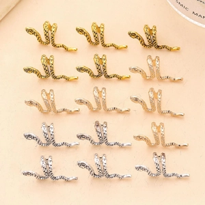 Set of snake shaped hair clips and earrings in gold, silver and rose gold metal finishes