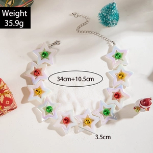 Detailed view of Christmas star choker with colorful bells, 35.9g weight and 34cm length