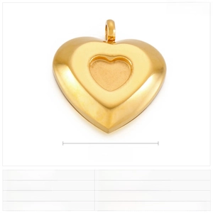 Macro detail of double heart stainless steel pendant showing gold and steel finishes