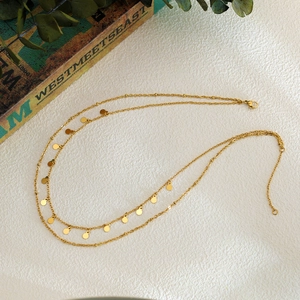 Double-layered 18K gold plated necklace with spotted geometric circular disc pendants