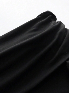 Sultry black off-the-shoulder knit mini dress with high waist and ribbed texture