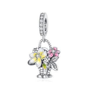 Silver flower basket charm with pink enamel blossoms and sparkling zircon stones