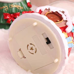 Bottom view of Christmas crystal ball music box with battery compartment and switch