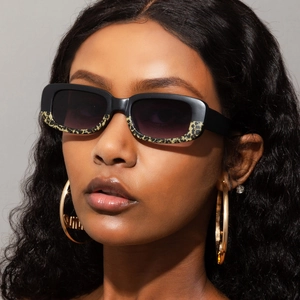 Retro rectangular sunglasses with black and leopard print frame and gradient lenses