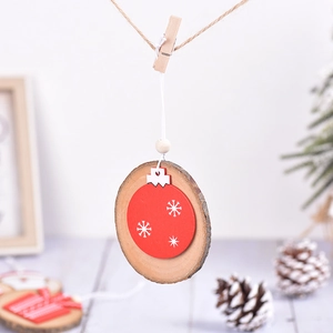 Handmade wooden Christmas ornament with red snowflake disc and natural wood bead