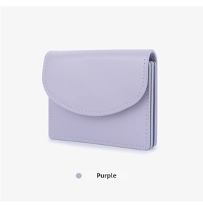 Detail of light purple card holder featuring accordion folds and premium leather texture