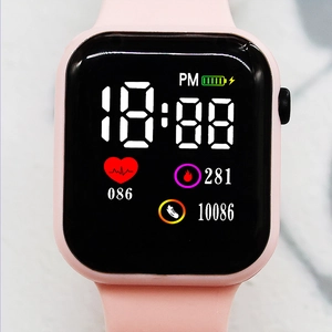 Detailed front view of pink LED digital watch screen with heart rate and step counter