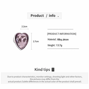 Tableau de taille détaillé pour la bague cœur en zircon rose avec dimensions et poids de 13,7g