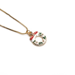Golden box chain necklace featuring a Christmas wreath pendant with red bow and gems