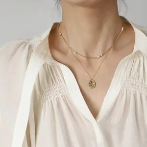 Double layered 18K gold plated stainless steel necklace with pearl beads and moon star pendant