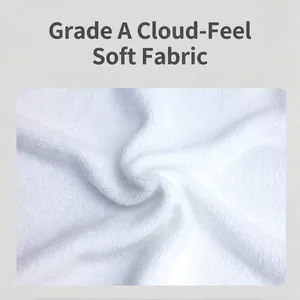 Absorbent microfiber beach towel with cloud-like soft texture and fluffy white fabric