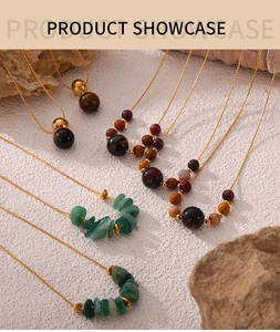 Detail of natural stone necklace featuring tiger eye and titanium steel chain