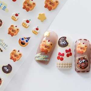 3D embossed Christmas nail stickers featuring cute cartoon bears and butter cookies