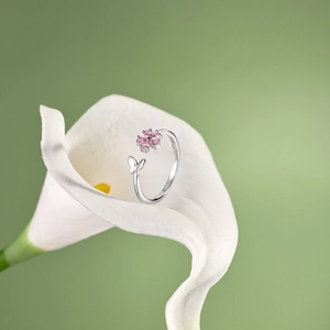 Detailed view of S925 silver ring featuring pink flowers and butterfly on Calla Lily