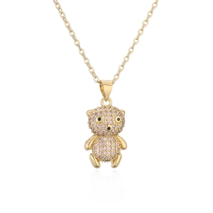 Gold-plated bear pendant necklace with pink cubic zirconia on a white background