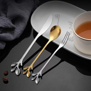 Leaf-shaped stainless steel cutlery set with silver knife, fork and golden spoon