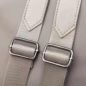 Women's Oxford cloth backpack with adjustable beige nylon straps and silver buckles