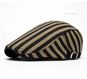 Detail view of khaki plaid cotton newsboy cap with adjustable silver metal buckle