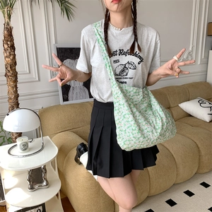 Floral canvas tote bag in fresh green and cream white with wide shoulder strap