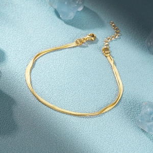 Detail of 925 sterling silver double-layer snake chain bracelet with lobster clasp