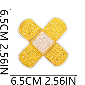 Detail of yellow band-aid shaped embroidered patch with size 6.5cm measurement