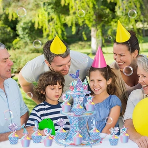 3-tier mermaid party cupcake stand with purple scales and ocean theme cake toppers