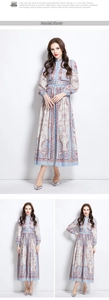 Detailed view of the baroque scroll patterns and stand collar of this blue palace maxi dress