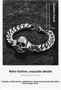 Macro shot of a silver punk skull bracelet on black fabric with gothic metallic details